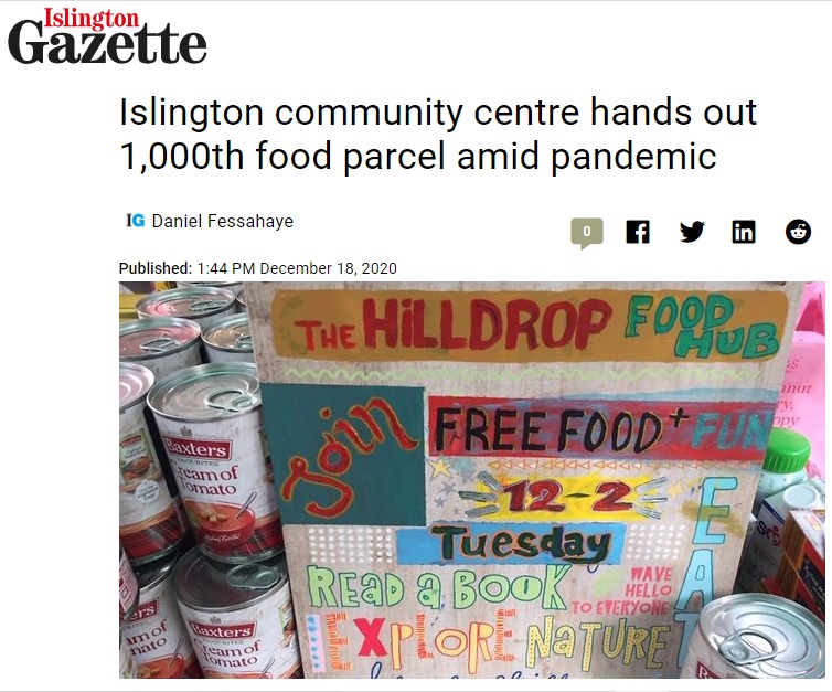 Excerpt from an Islington Gazette article. The headline is "Islington community centre hands out 1000th food parcel amid pandemic" by Daniel Fessahaye. Image below headline of painted sign reading "The hilldrop food hub. Join free food + fun, 12-2. Read a book, wave hello to everyone, eat, explore nature" next to tins of soup.